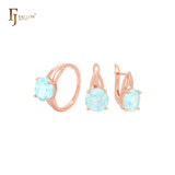 Conjunto de joyas de oro rosa con circonitas cúbicas azules lago y solitario grande con anillos