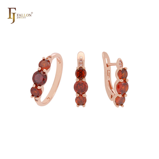 Conjunto de joyas compacto de oro rosa con circonitas rojas escarlatas triples redondeadas y anillos