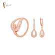 Conjunto de joyas de oro rosa con anillos y ramas florecientes de circonitas blancas