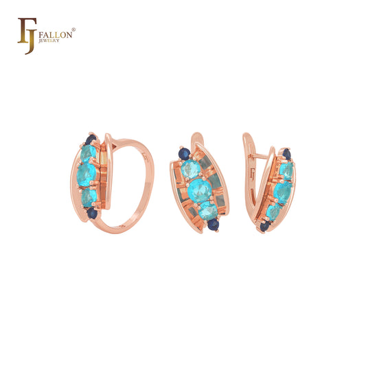 Conjunto de joyería de oro rosa con anillos y concha abierta que incluye cinco circonitas azules mixtas