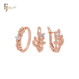 Conjunto de joyas de oro rosa con solitario de circonita blanca y anillos en forma de rama floreciente