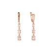 Aretes colgantes de tres piedras con circonitas de colores en Oro 14K, baño de oro rosa en colores