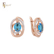 Pendientes de clip en dos tonos de oro rosa con halo solitario, circonitas blancas y azul océano