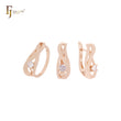 Conjunto de joyas de oro rosa con circonitas blancas y anillos, con lazo retorcido