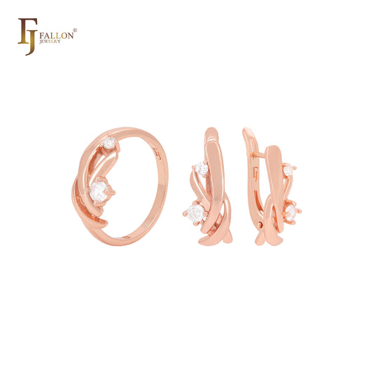 Conjunto de joyas de oro rosa con anillos y cintas cruzadas entrelazadas y retorcidas con doble circonita blanca