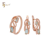 Conjunto de joyas de oro rosa con circonitas marquesinas de doble azul lago y pendientes.