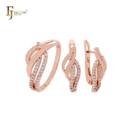 Conjunto de joyas de oro rosa con anillos y circonitas blancas pavimentadas que se cruzan en una cinta.