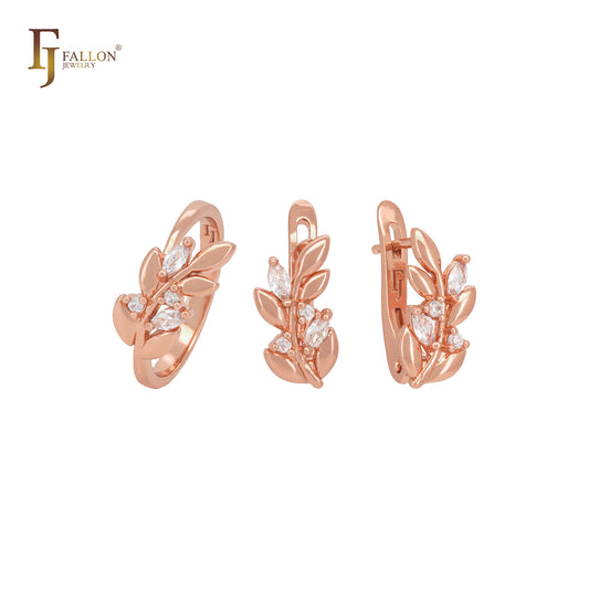 Conjunto de joyas de oro rosa con anillos y flores florecientes con circonitas blancas.
