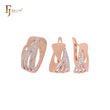 Conjunto de joyas de dos tonos en oro rosa con circonitas blancas entrelazadas y anillos