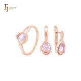Conjunto de joyas de oro rosa de dos tonos con solitario de circonita cúbica y halo rosa y morado en forma de pera y anillos