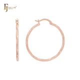 Aros de oro rosa de 14 quilates con textura de serpiente brillante
