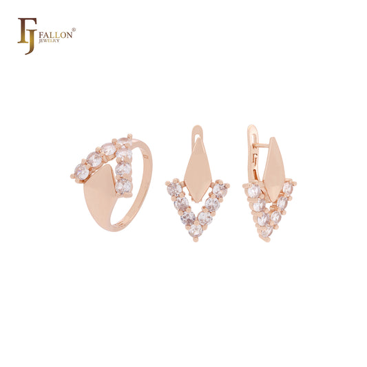 Conjunto de joyas con anillos en oro rosa y circonitas cúbicas blancas en forma de V y forma de chevrón.