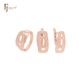Conjunto de joyas de oro rosa con anillos y ventanas superpuestas geométricas de doble círculo.
