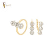 Schmuckset aus Roségold mit drei weißen Zirkoniasteinen und Ringen