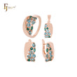 Conjunto de joyas de oro rosa con circonitas azules en racimo, anillos y colgante