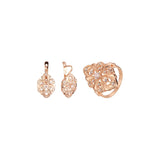 Conjunto de circonitas triangulares con solitario en oro rosa
