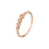 Anillos de cuatro piedras en Oro de 14K, colores baño de Oro Rosa