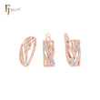 Conjunto de joyas de oro rosa de dos tonos con hojas y ramas pavimentadas con circonitas blancas y anillos.