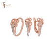 Maravilloso diseño de vides entrelazadas con circonitas blancas. Conjunto de joyas de oro rosa de dos tonos con anillos.