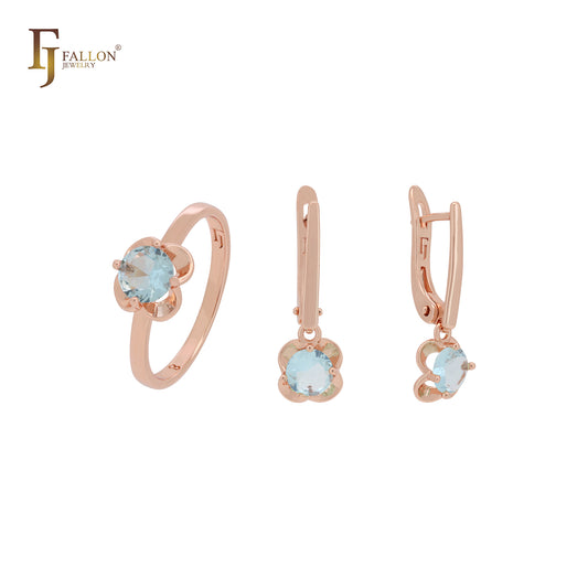 Conjunto de joyas minimalistas de oro rosa con circonita cúbica azul lago redonda de corte radiante y anillos.