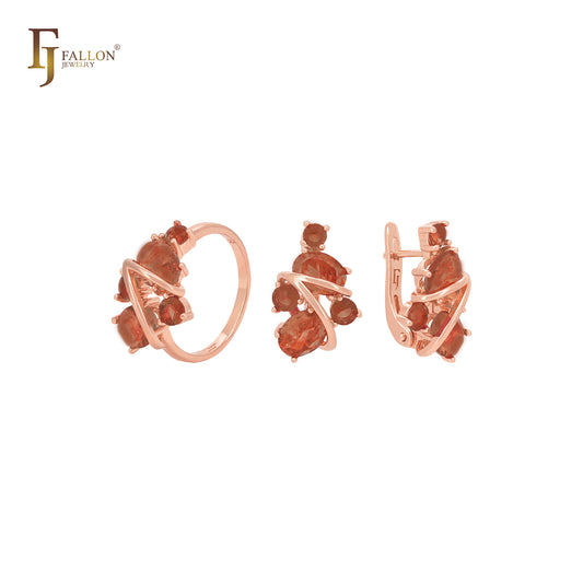 Gran conjunto de joyas de oro rosa con anillos en color café rojo con circonitas grandes