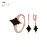 Conjunto de joyas con anillos en oro rosa y estrella de rombos negros pintados