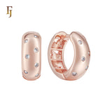 Small white CZs mixed with Stars Rose Gold Huggie Earrings