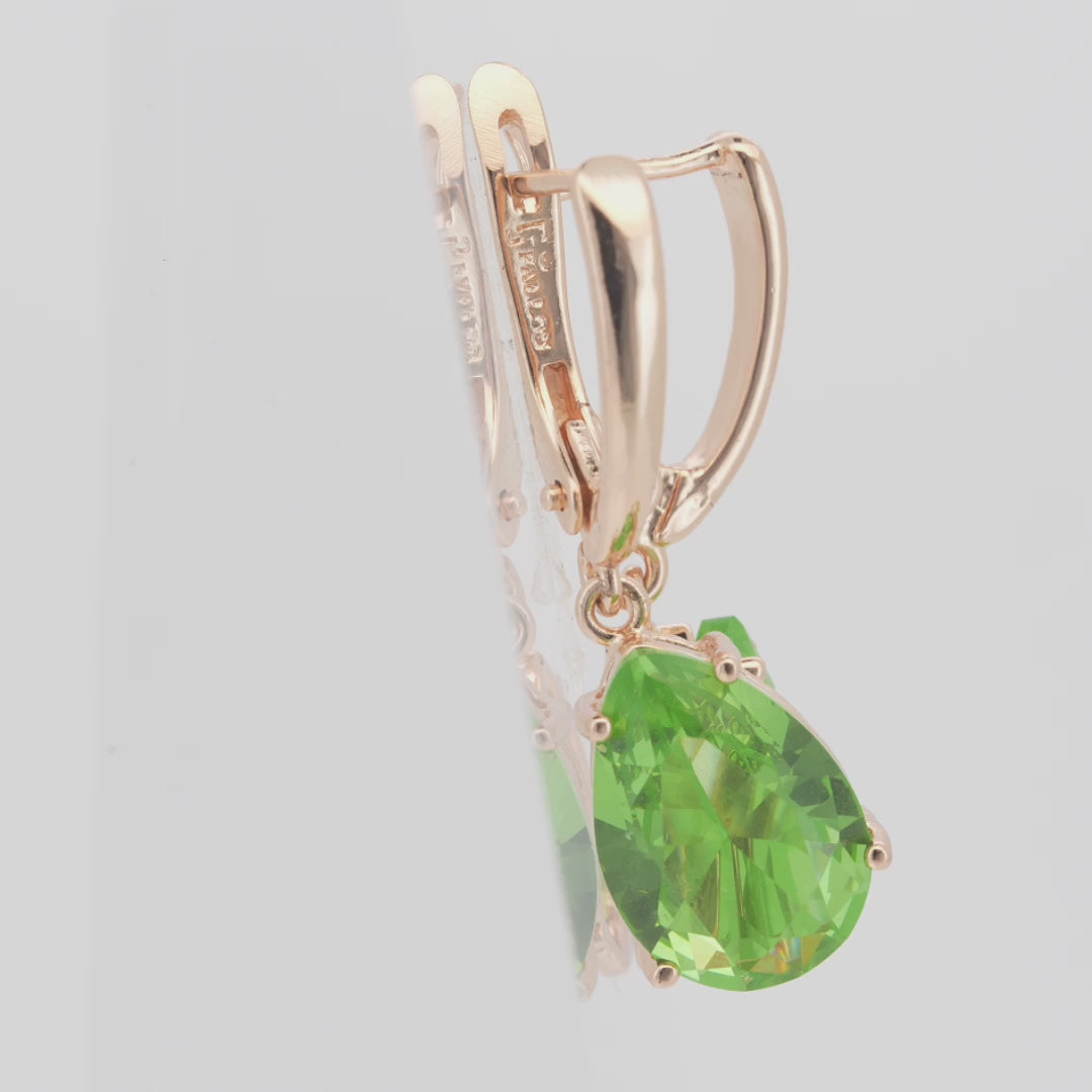 .Aretes de piedra en forma de lágrima en colores chapados en oro de 14 quilates, oro rosa y oro blanco.