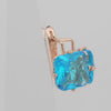 El tesoro de Ashlee: aretes de oro rosa de 14 quilates con circonitas cúbicas de colores y corte esmeralda en solitario.