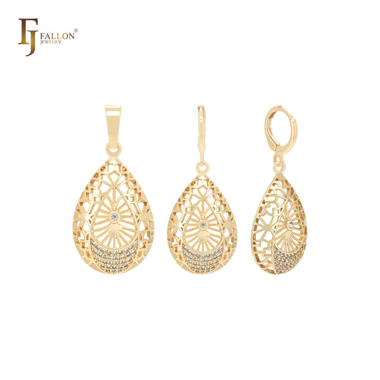 Conjunto de joyería en oro de 14 quilates con filigrana de circonitas blancas y colgante.