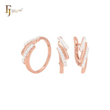 Conjunto de joyas de oro rosa de dos tonos con cuatro filas de circonitas blancas y anillos.