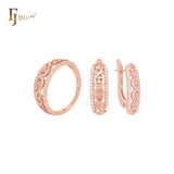 Conjunto de joyas de oro rosa con anillos y diseño de vides y ramas con circonitas blancas