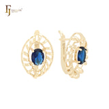 Pendientes de clip con solitario giratorio de talla marquesa y circonita azul ovalada en oro de 14 quilates