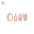 Conjunto de joyas de oro rosa con anillos, ovalado, redondeado y dos circonitas blancas.