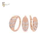 Conjunto de joyas bicolor en oro rosa con tres flechas de circonitas blancas y anillos.