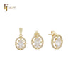 Pequeño conjunto de joyas de oro de 14 quilates con solitario ovalado de circonitas blancas, colgante y pendientes tipo botón.