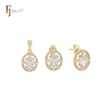 Pequeño conjunto de joyas de oro de 14 quilates con solitario ovalado de circonitas blancas, colgante y pendientes tipo botón.