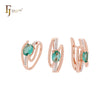 Conjunto de joyas de oro rosa 585 en dos tonos con solitario ovalado y cinta de circonita verde y anillos.