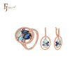 Lujoso conjunto de joyas de oro rosa con circonitas cúbicas en azul lago y azul profundo y anillos