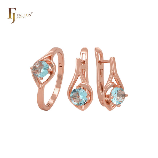 Conjunto de joyas de oro rosa con solitario redondo de circonita cúbica azul lago y anillos