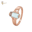 Anillos de compromiso de oro rosa con circonita cúbica azul lago de corte triangular