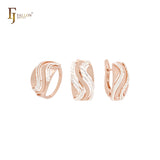 Conjunto de joyas de dos tonos en oro rosa con filas geométricas onduladas curvas y anillos