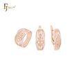 Conjunto de joyas de dos tonos en oro rosa con miles de cintas entrelazadas y anillos