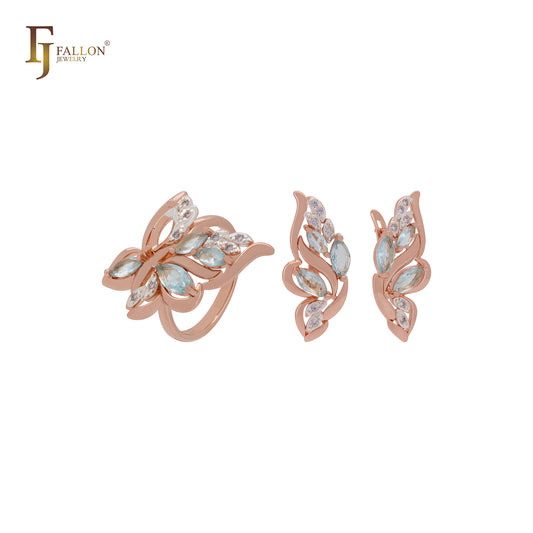 Conjunto de joyas de oro rosa de dos tonos con anillos y hojas de flores en racimo de circonitas azul lago.
