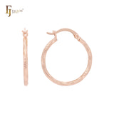 Aros de oro rosa de 14 quilates con textura de serpiente brillante