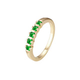 Alianza Oro 14K cinco anillos piedras talla esmeralda