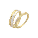 Anillos apilables de dos tonos, oro rosa, oro de 14 quilates y filas de conos dobles