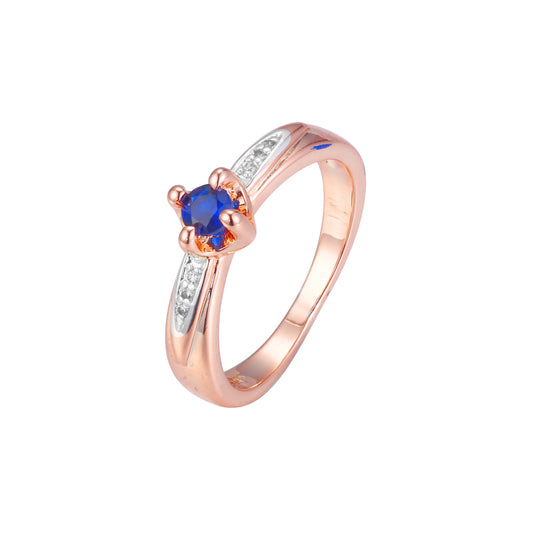 Anillos de oro rosa con dos tonos de piedra azul solitario