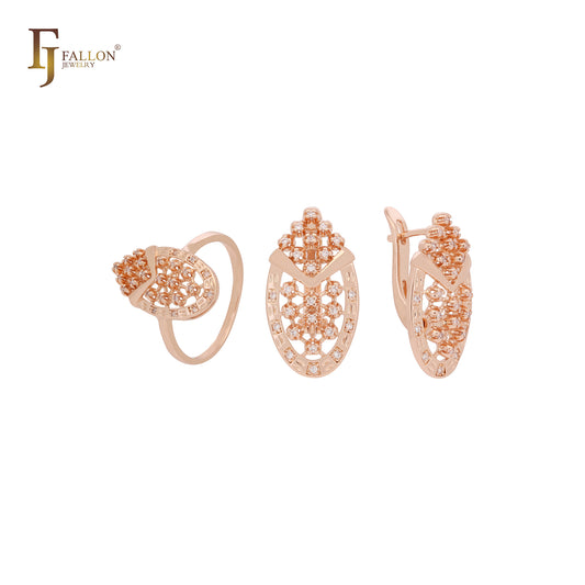 Conjunto de joyas de oro rosa con anillos y circonitas blancas en forma ovalada con textura de filigrana