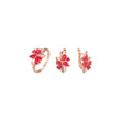 Conjunto de flores y hojas rojas en racimo de oro rosa